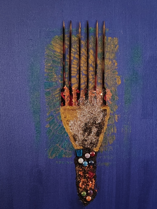 Ebony Beauty Heritage by Serj Éty’n — framed mixed-media artwork displayed in a modern living room, featuring a stylized Afro comb on a deep blue background with textured glitter, dark vertical spikes, and colorful bead details symbolizing Black heritage and identity.
