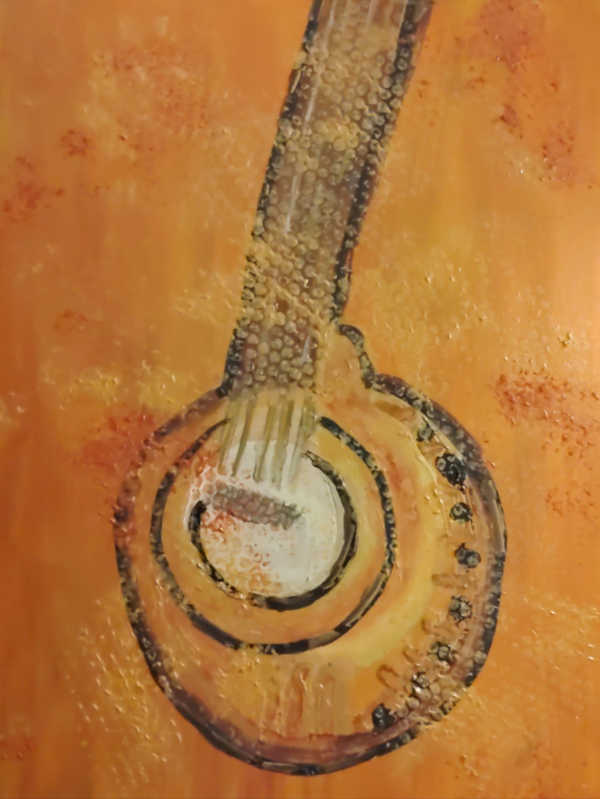 Abstract textured artwork titled “Enchanting Sound” by Serj Éty’n featuring a circular resonant form with layered orange tones and bubble-like textures symbolizing sound waves and vibration energy.