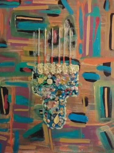 Revelation Of Hidden AfrobeautyAbstract mixed-media artwork featuring colorful geometric brushstrokes and a textured central sculptural form decorated with beads, pearls, buttons, and ornamental elements symbolizing hidden Afro beauty and cultural identity.